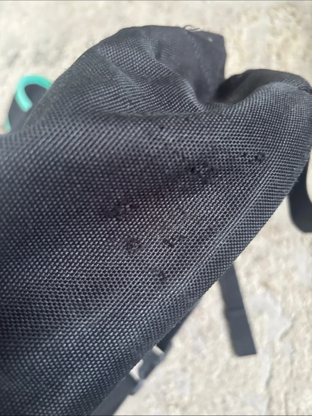 The North Face Black Backpack with Teal Trim and Bungee